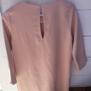 Light pink mini dress.